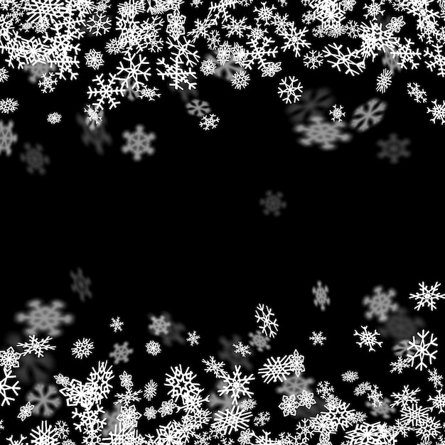 Fond de neige avec des flocons de neige floues dans le noir
