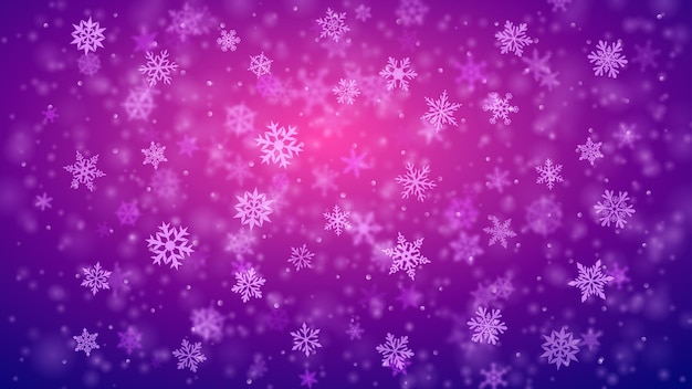Fond de Noël de flocons de neige tombants flous et clairs complexes dans des couleurs violettes avec effet bokeh