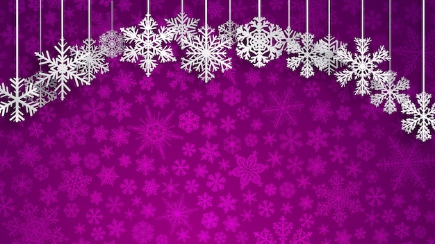 Fond de Noël avec de gros flocons de neige suspendus blancs sur fond violet de petits flocons de neige