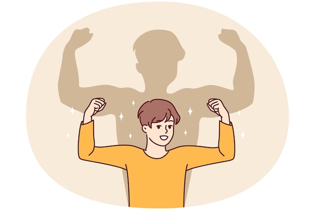 Un garçon souriant, un enfant musclé qui rêve de devenir grand et fort, un enfant heureux qui s'imagine.