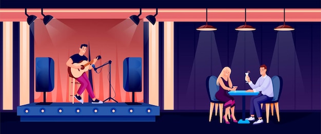 Gens dans un bar de nuit ou un pub jeune homme jouant de la guitare sous les projecteurs rendez-vous romantique à table Activités récréatives en soirée