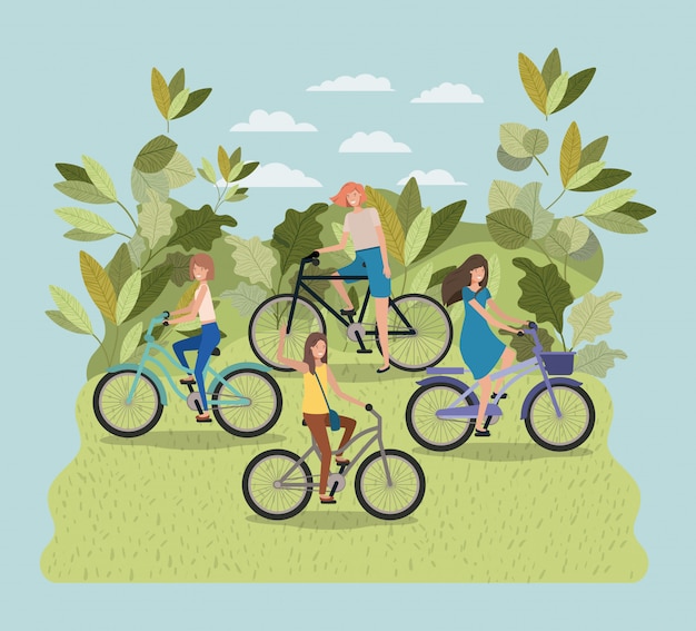 groupe de jeunes femmes en vélo sur parc