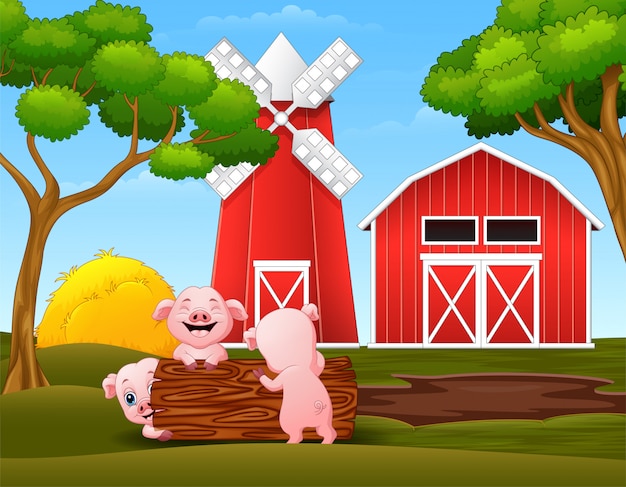 Vecteur heureux trois petit cochon jouant des bûches à la ferme