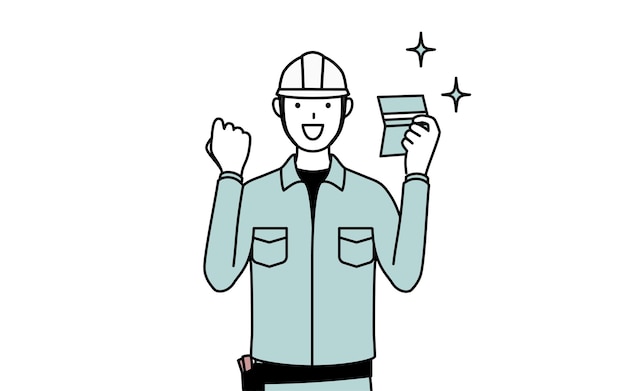 Un homme en casque et en vêtements de travail qui est content de voir un livre de banque