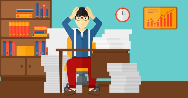 Homme désespéré assis dans le bureau.