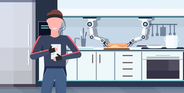 Homme Humanoïde Avec Des Fils électrodes Indicateurs à L'aide D'une Application Mobile Contrôlant Le Robot De Poche Intelligent Intelligent Assistant Robotique Innovation Concept D'intelligence Artificielle Intérieur De Cuisine Moderne Horizontal