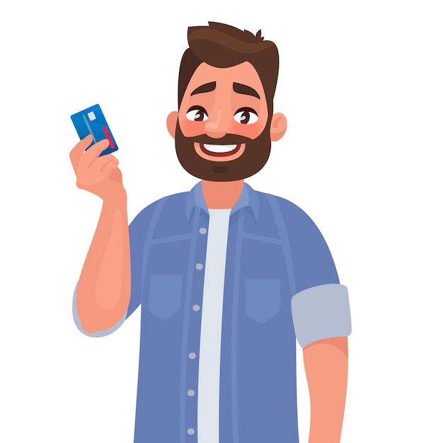 L'homme tient une carte de crédit dans sa main.