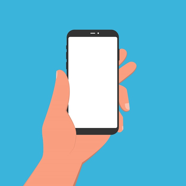 L'homme tient dans sa main un smartphone.