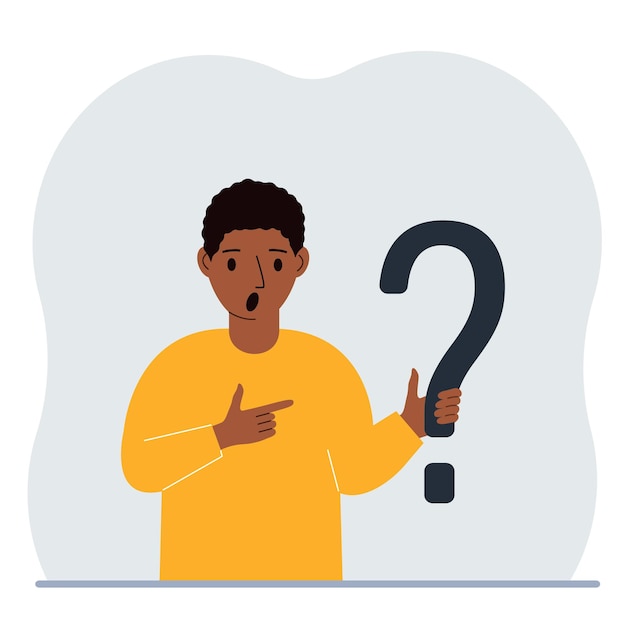 Un homme tient un symbole de point d'interrogation Poser des questions et chercher des réponses FAQ ou concept de questions fréquemment posées centre de support en ligne