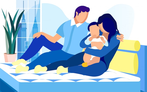 Jeune Famille Avec Bébé Garçon Sur Lit Avec Matelas Confortable.