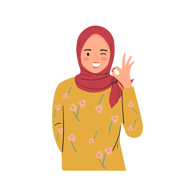 Jeune Femme Un Clin De œil, Souriant Et Faisant Signe Ok Avec Le Geste De La Main. Jolie Dame Porte Le Hijab.