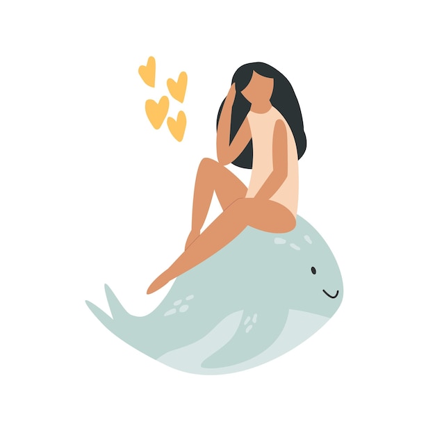 Jeune jolie fille assise sur une baleine