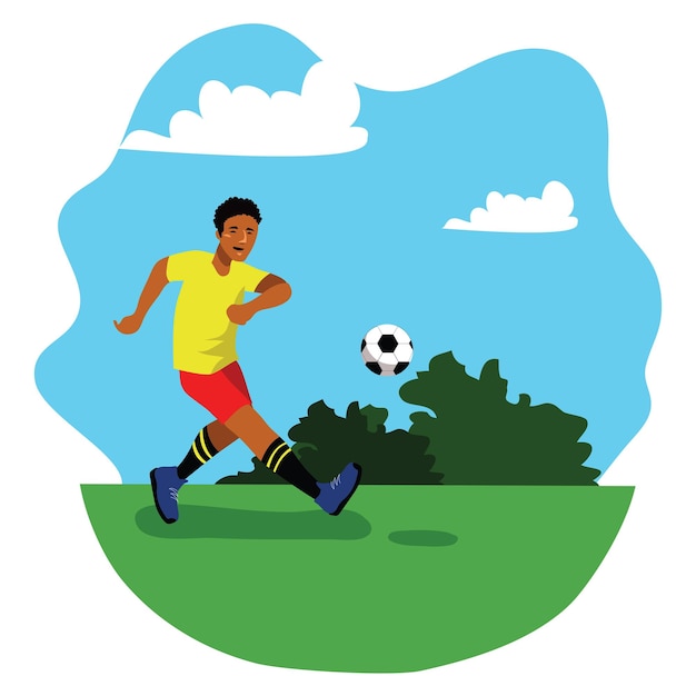 Joueur de football en uniforme de sport donnant un coup de pied au football