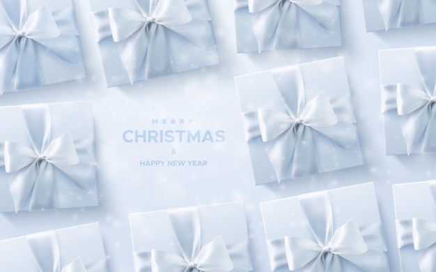 Joyeux Noël Et Bonne Année Coffrets Cadeaux Blancs Avec Des Rubans Et Des Arcs Sur Fond Blanc
