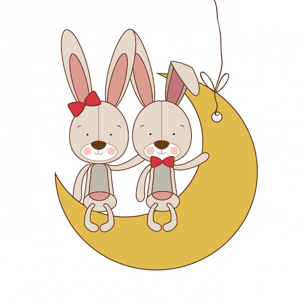 Lapins Mignons Assis Sur La Lune