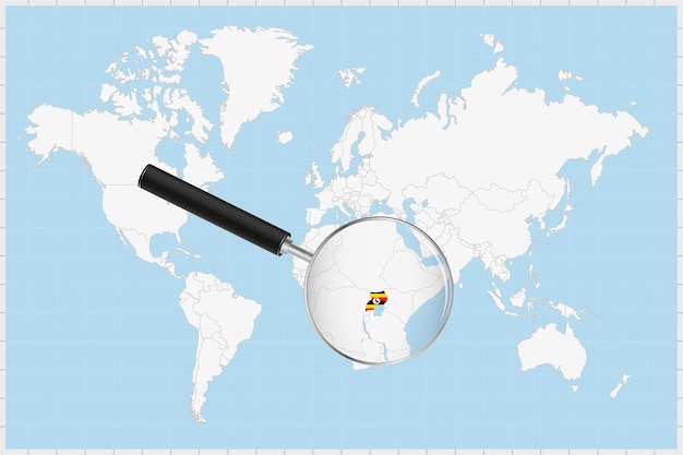 Vecteur une loupe montrant une carte de l'ouganda sur une carte du monde