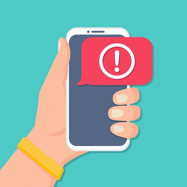 Main tenant le smartphone avec notification de message d'alerte dans un design plat
