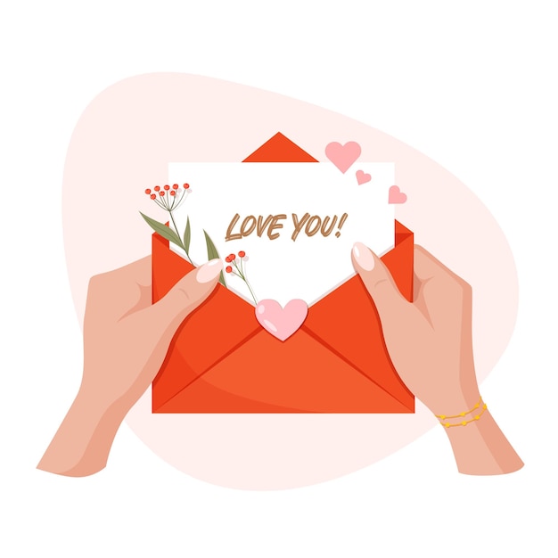 Mains tenant une enveloppe avec des coeurs et du texte Je t'aime. Concept pour la Saint-Valentin.