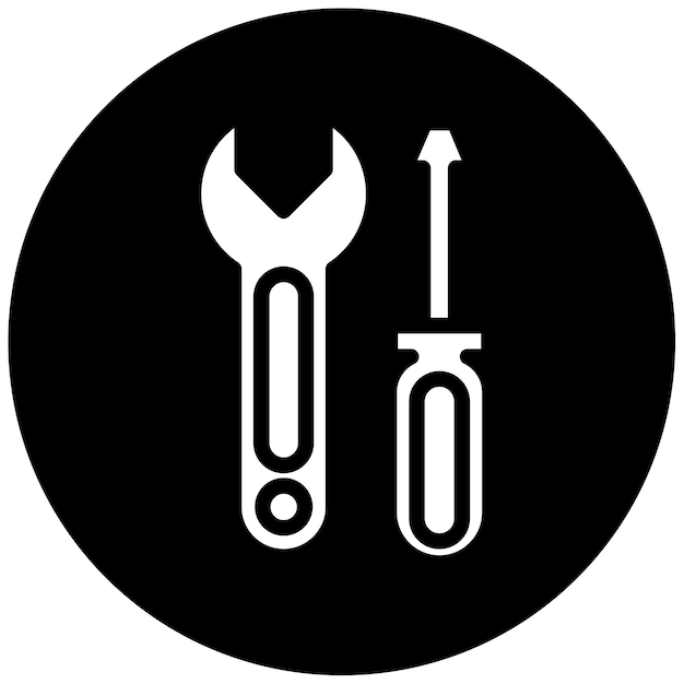 un marteau et une clé sont placés sur un cercle noir