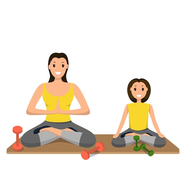 Mère et fille impliquées Sport engagé dans le yoga