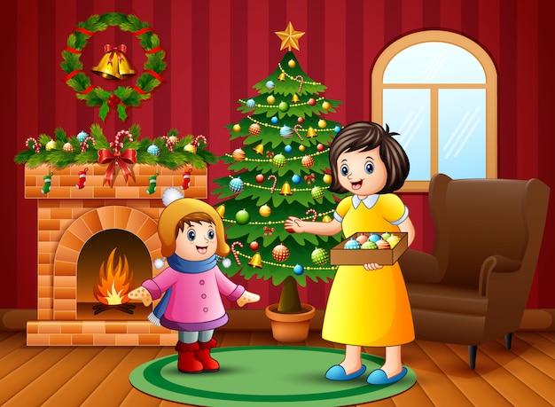 Mère Et Petite Fille Veulent Décorer Un Sapin De Noël