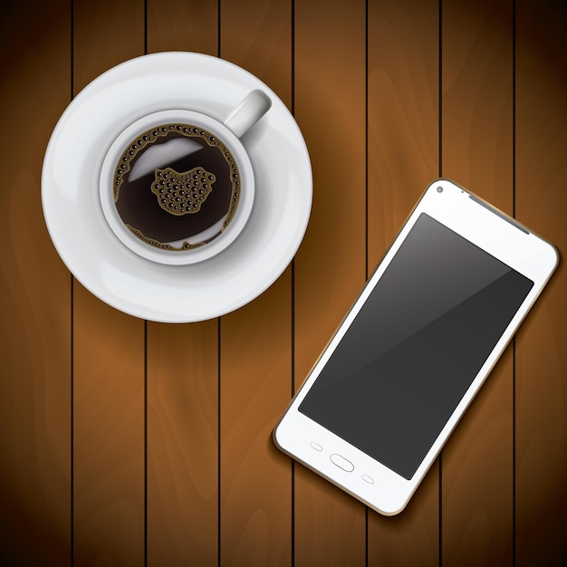 Modèle de maquette de téléphone portable réaliste avec une tasse de café sur fond de bois