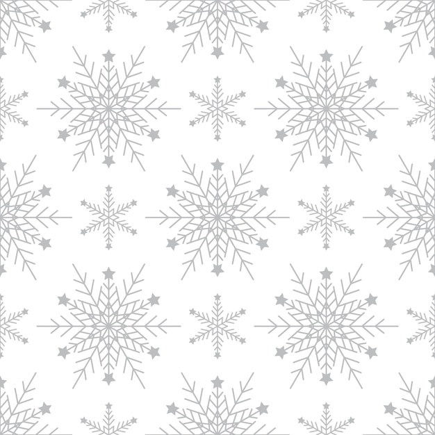 Modèle sans couture avec des flocons de neige argentés sur fond blanc décoration traditionnelle d'hiver festif fo...