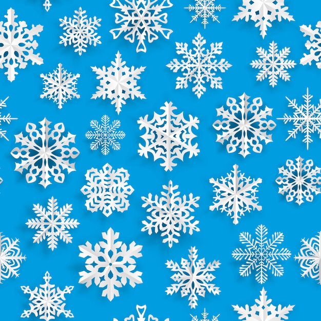 Modèle sans couture de Noël avec des flocons de neige en papier blanc sur fond bleu clair