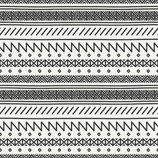 Modèle sans couture tribal dessinés à la main