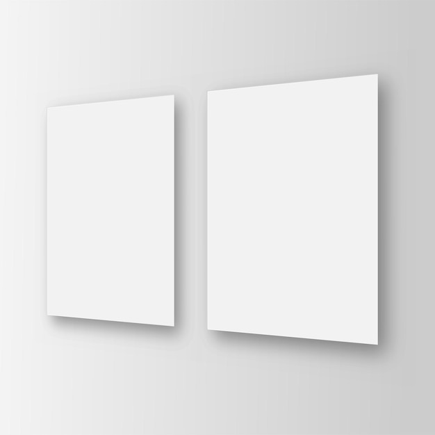 Modèle vierge de deux feuilles blanches sur le mur