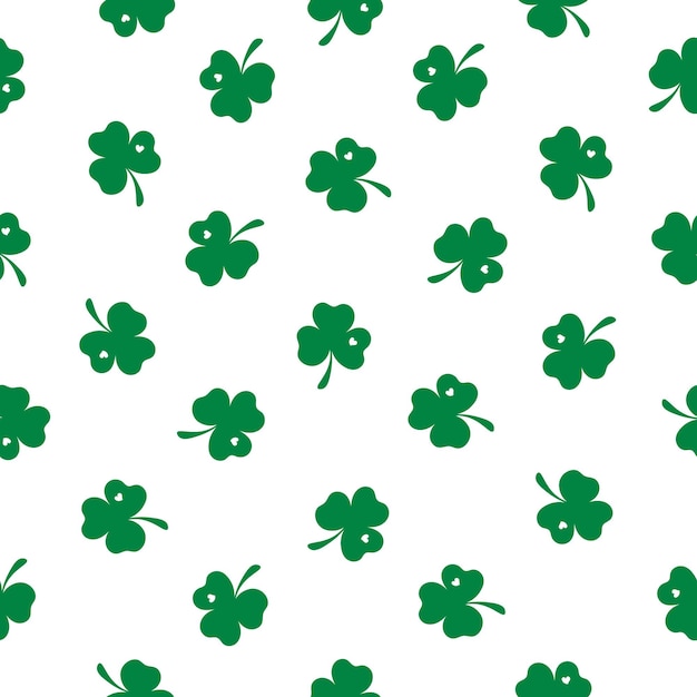 Vecteur motif sans couture avec un petit trèfle vert sur un fond blanc vecteur de la fête de saint-patrick