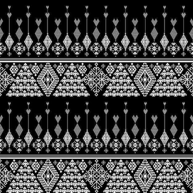 motif de tissu tribal sans couture fond noir et blanc utilisé pour concevoir des tissus pour la confection de vêtements