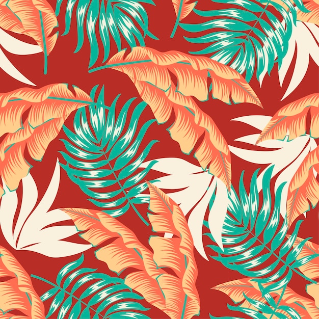 Motif Tropical Harmonieux Abstrait Avec Des Plantes Et Des Feuilles Colorées Lumineuses Sur Fond Rouge