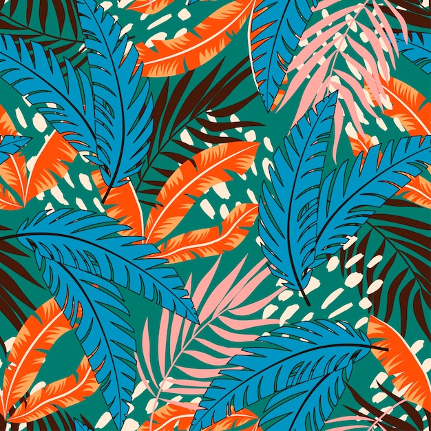 Motif tropical harmonieux abstrait avec des plantes lumineuses et des feuilles sur fond vert