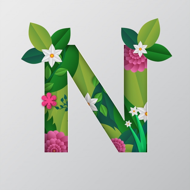 N alphabet fait par des fleurs et des feuilles avec un style de papier découpé.