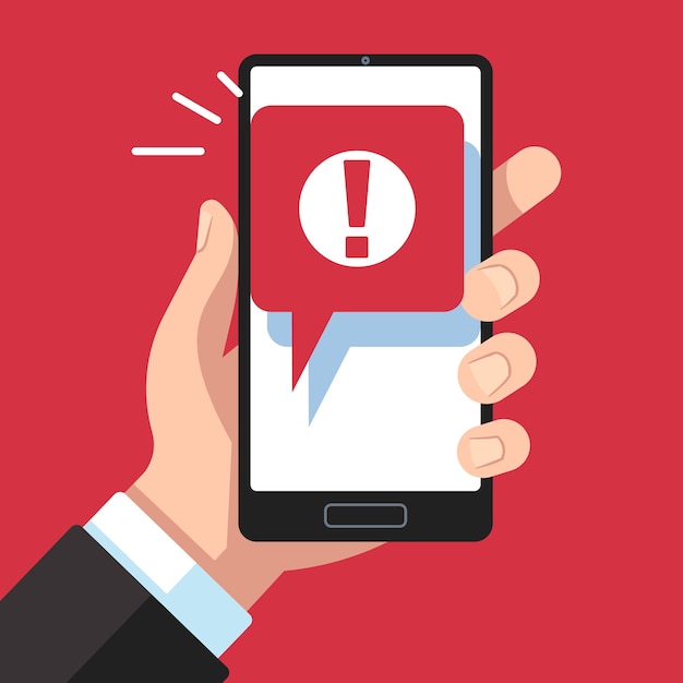 Notification mobile de message d'alerte. Main tenant le smartphone avec signe d'exclamation