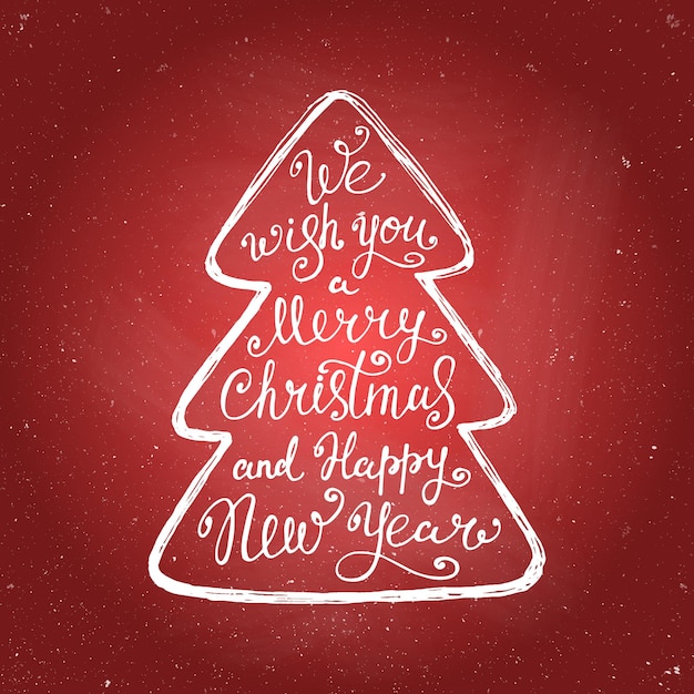 Nous vous souhaitons un joyeux Noël et une bonne année dans un arbre de Noël avec de la craie sur fond rouge. Conception de lettrage à la main par flyer bannière affiche impression mailing