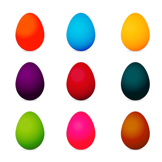 Oeufs de Pâques réalistes colorés isolés sur blanc