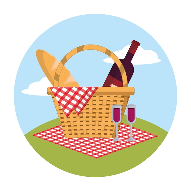 panier avec du vin et du pain dans la décoration de la nappe