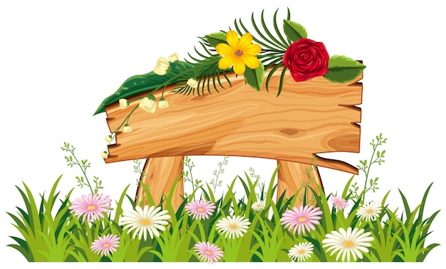 Panneau en bois dans l&#39;herbe avec des fleurs