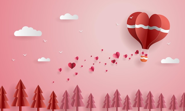 Papier Découpé Amour Et Saint Valentin, Le Ballon Origami Flotte Dans L'air Et Disperse Les Cœurs Au-dessus Des Pins.