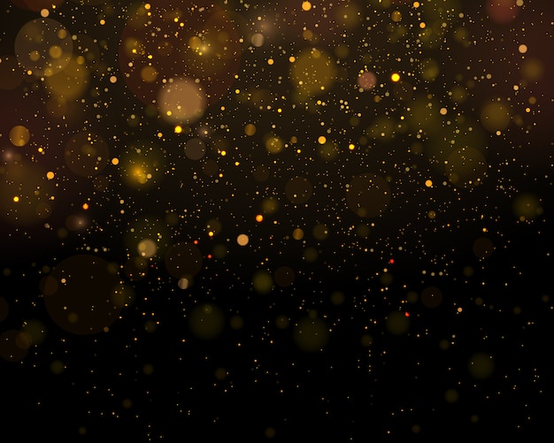 Des particules de poussière magiques scintillantes. Abstrait avec effet bokeh.