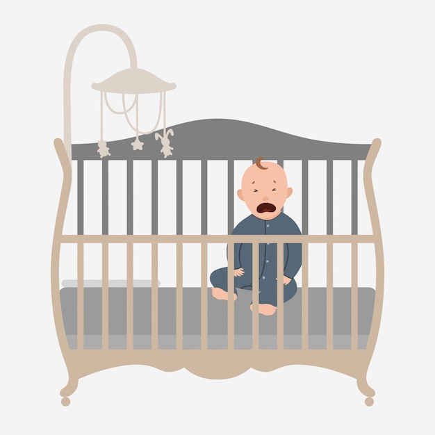 Petit bébé qui pleure dans le lit.