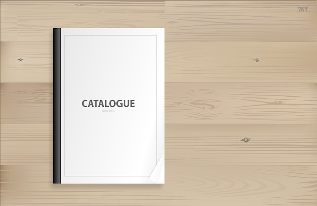 Reliure de livre avec couverture vide pour le fond sur le bois.
