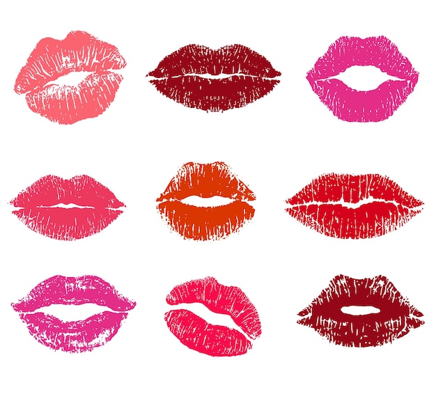 Le rouge à lèvres, l'impression du baiser, l'ensemble isolé, les lèvres rouges, les différentes formes des lèvres féminines sexy, roses et rouges, sexy.
