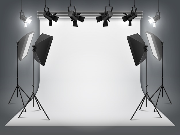 Studio de photographie. Toile de fond photo et projecteur, projecteur réaliste avec trépied et équipement de studio
