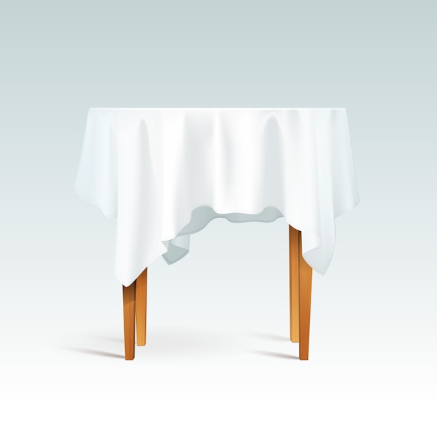 Table ronde en bois vide avec nappe