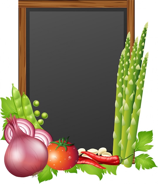 Tableau noir avec des légumes frais