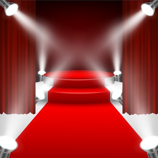 Tapis rouge au podium avec des spots et un rideau rouge