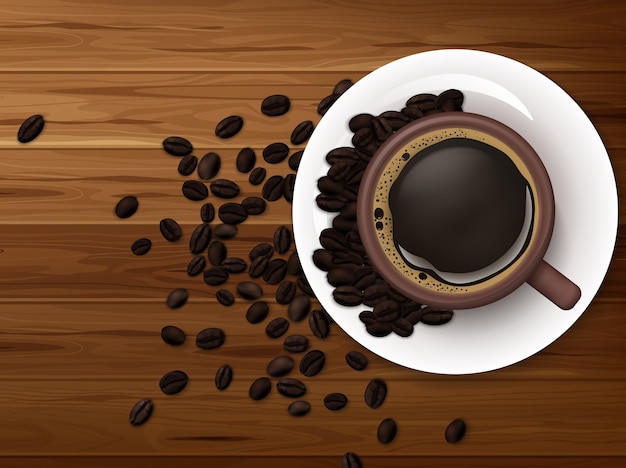 Tasse de café avec grains de café sur fond en bois